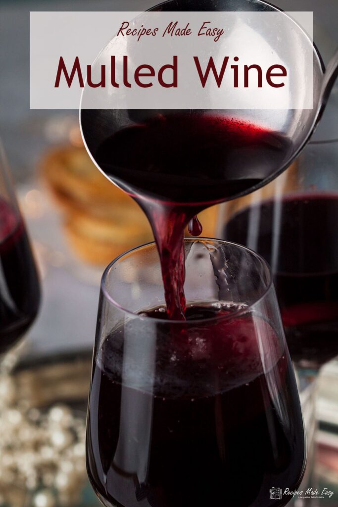 pouring mulled wine into a glass.