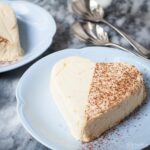 white chocolate parfait heart on blue plate.