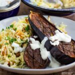 roasted aubergine and saffron rice topped with yogurt sauce.