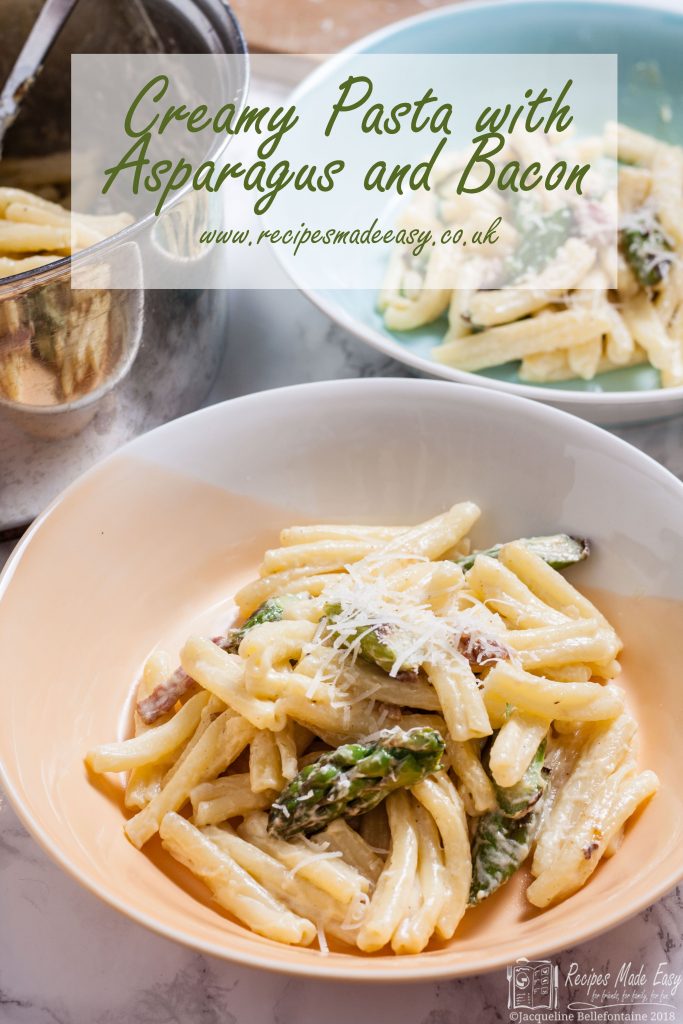 bowl of creamy pasta with asparagus and bacon