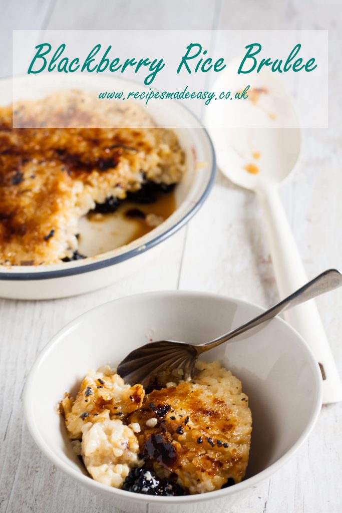bowl of blackberry rice brulee with main dish in background and text over lay