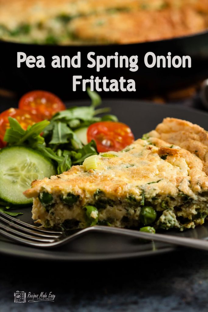 portion of pea and spring onion (scallion) frittata on plate with pan behind.