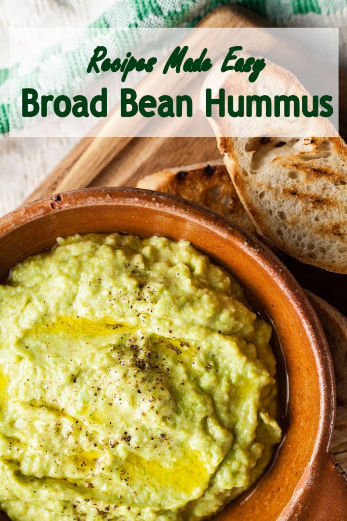 broad bean hummus in a bowl with croutes on the side.