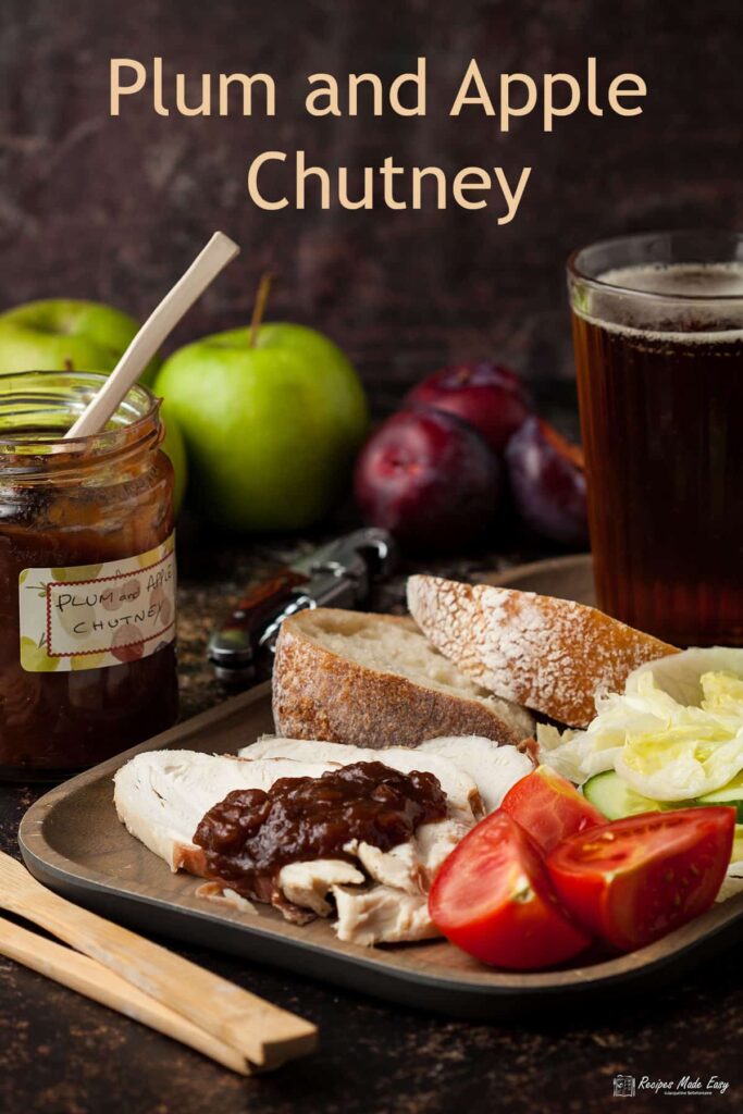 ploughmans lunch platter with plum and ale spooned on cold meat.