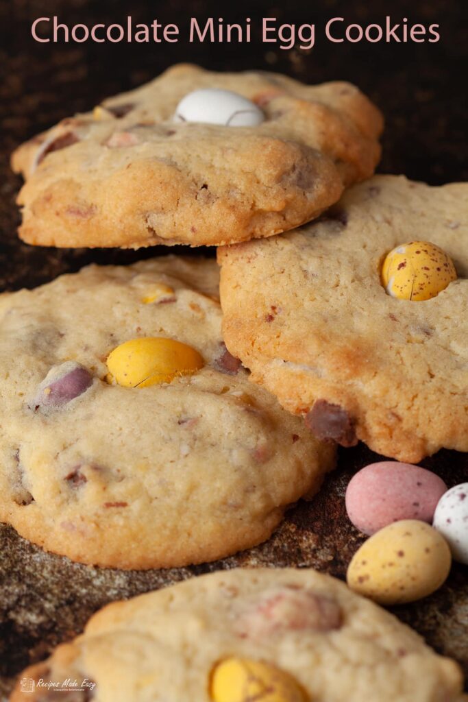 4 chopcolate mini egg cookies with mini eggs on side.