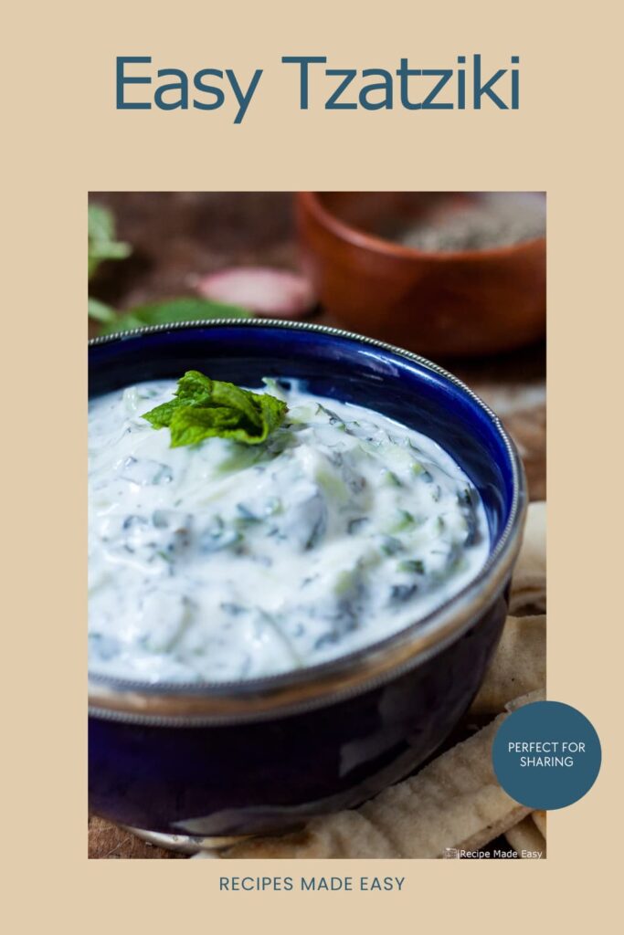 tzatziki in bowl garnished with mint. with text overlay for pinterest.